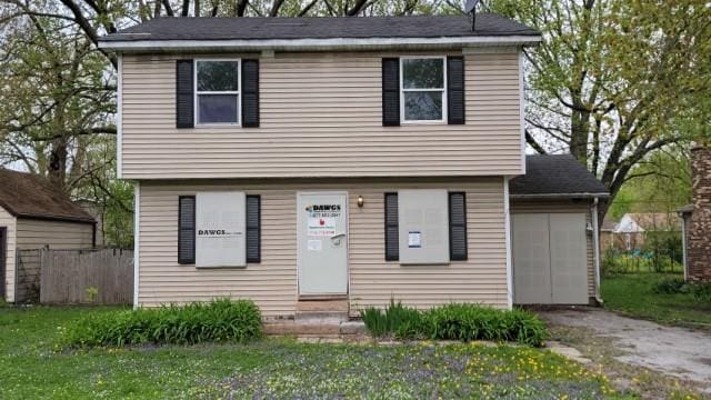 15622 Millard Ave, Markham, IL 60428 - colonial-style house with fence, driveway, and entry steps