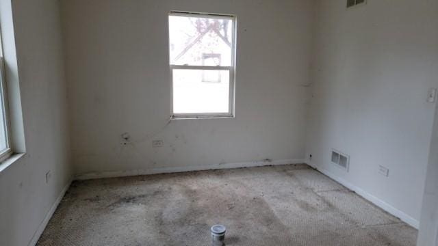 15622 Millard Ave, Markham, IL 60428 - empty room featuring baseboards, visible vents, and carpet