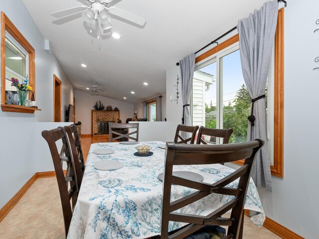 11554 S Neenah Ave, Worth, IL 60482 - dining space featuring a ceiling fan, a brick fireplace, baseboards, and recessed lighting