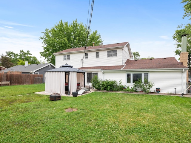 11554 S Neenah Ave, Worth, IL 60482 - rear view of property featuring a gazebo, an outdoor fire pit, and a chimney