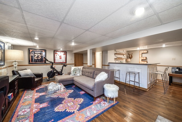 254 Spring Ave, Glen Ellyn, IL 60137 - living area with bar, wood finished floors, a paneled ceiling, recessed lighting, and baseboards