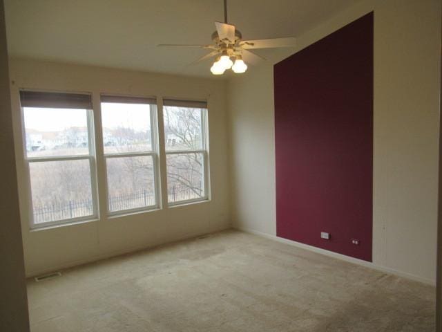 2844 Waterfront Ave, Algonquin, IL 60102 - unfurnished room with visible vents, ceiling fan, carpet flooring, and baseboards