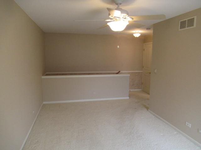 2844 Waterfront Ave, Algonquin, IL 60102 - unfurnished room featuring visible vents, baseboards, a ceiling fan, and light colored carpet