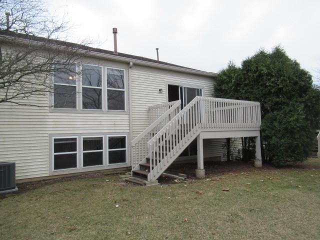 2844 Waterfront Ave, Algonquin, IL 60102 - rear view of house with central AC unit, a deck, a lawn, and stairs