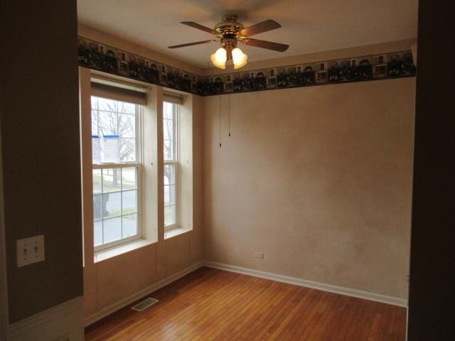 2844 Waterfront Ave, Algonquin, IL 60102 - empty room with visible vents, baseboards, a ceiling fan, and light wood-style floors