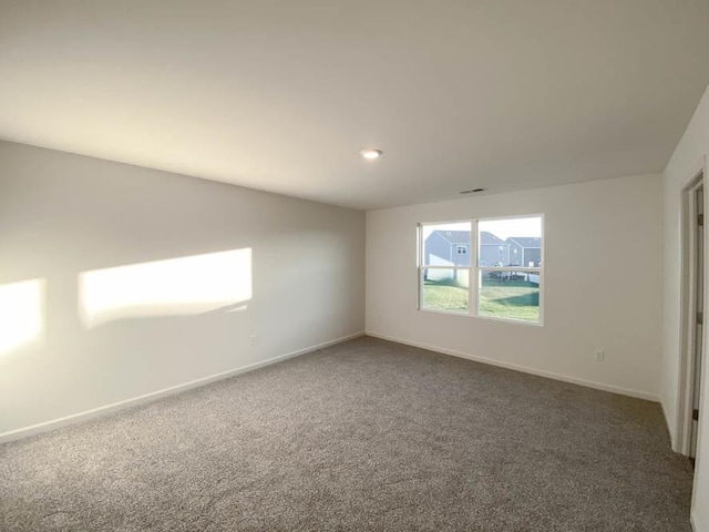 2011 Winterberry Trl, Wonder Lake, IL 60097 - unfurnished bedroom with visible vents, baseboards, and carpet floors