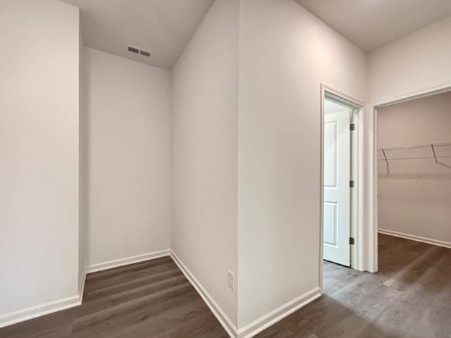 2011 Winterberry Trl, Wonder Lake, IL 60097 - corridor with visible vents, baseboards, and wood finished floors