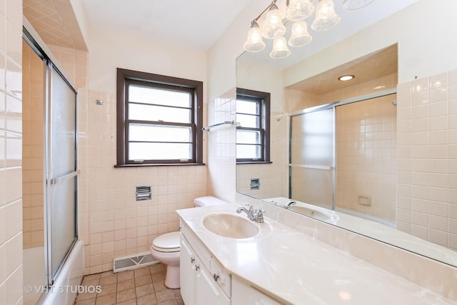 1226 Strieff Ln, Flossmoor, IL 60422 - bathroom with tile patterned flooring, vanity, shower / bath combination with glass door, tile walls, and a chandelier