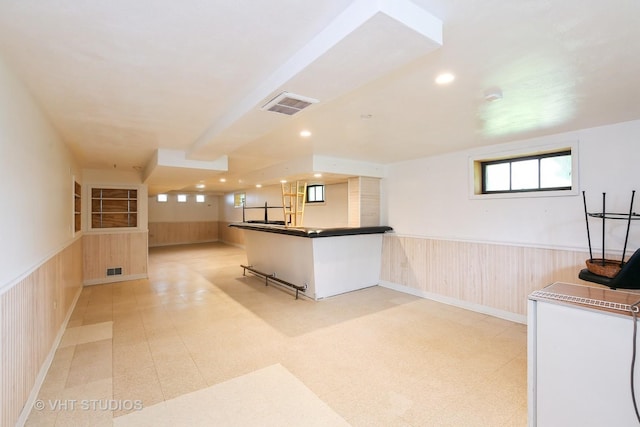 1226 Strieff Ln, Flossmoor, IL 60422 - kitchen with wainscoting, wood walls, dark countertops, light flooring, and recessed lighting