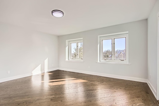 2658 E Royal Ridge Dr, Crete, IL 60417 - empty room featuring baseboards and dark wood-style floors