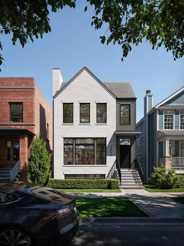 3846 N Bell Ave, Chicago, IL 60618 - view of front facade with brick siding and entry steps