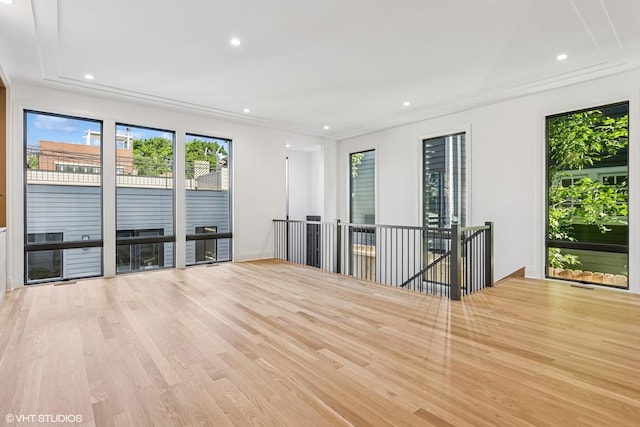 3846 N Bell Ave, Chicago, IL 60618 - unfurnished living room with recessed lighting and wood finished floors