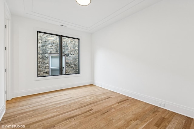 3846 N Bell Ave, Chicago, IL 60618 - empty room featuring light wood-style floors and baseboards