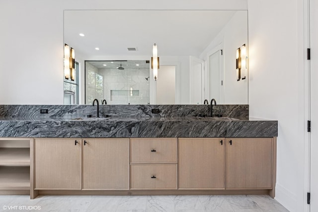 3846 N Bell Ave, Chicago, IL 60618 - full bathroom with a stall shower, double vanity, marble finish floors, and recessed lighting
