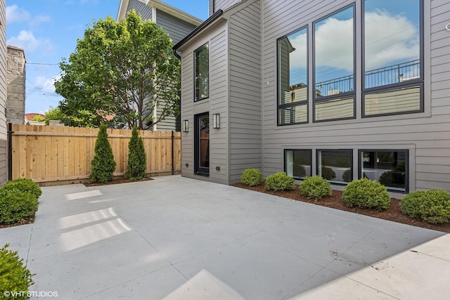 3846 N Bell Ave, Chicago, IL 60618 - view of side of home featuring a patio area