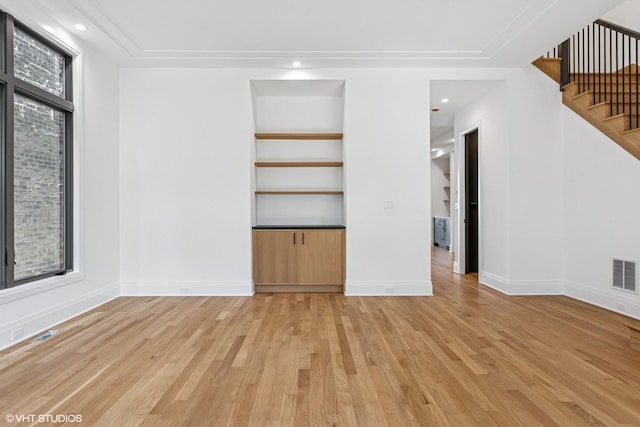 3846 N Bell Ave, Chicago, IL 60618 - unfurnished living room featuring light wood-style floors, stairs, and recessed lighting