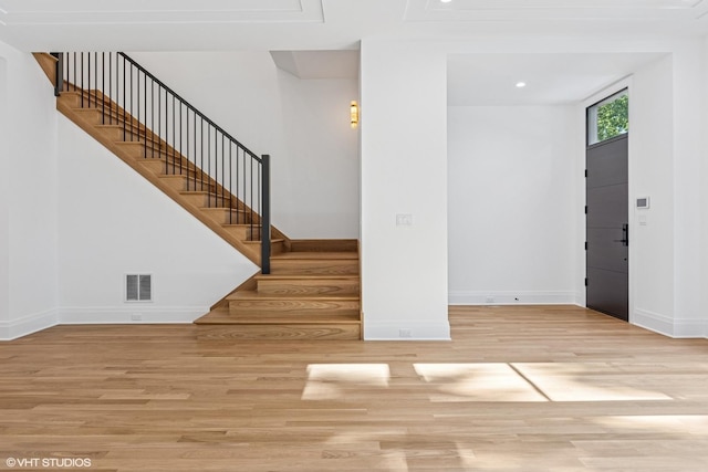 3846 N Bell Ave, Chicago, IL 60618 - entrance foyer featuring stairway, wood finished floors, and recessed lighting