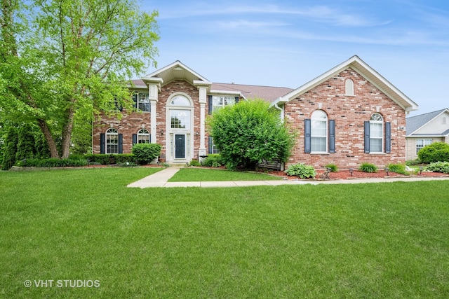 1641 Foster Cir, Algonquin, IL 60102 - view of front of home featuring brick siding and a front yard