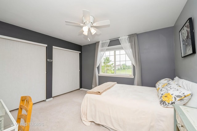 1641 Foster Cir, Algonquin, IL 60102 - carpeted bedroom featuring two closets and ceiling fan