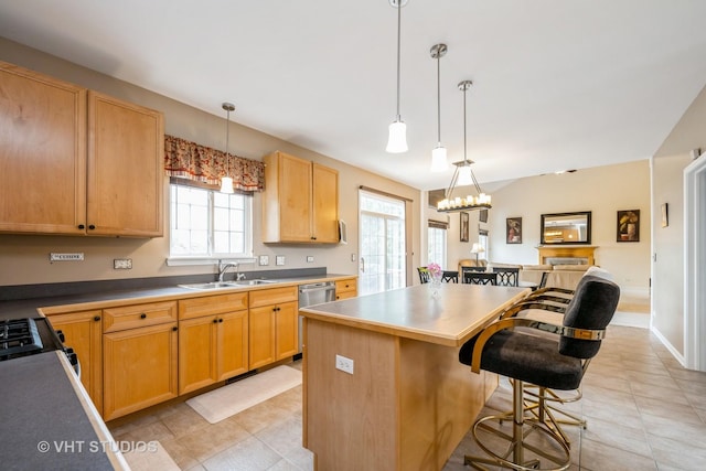 1641 Foster Cir, Algonquin, IL 60102 - kitchen featuring a sink, a center island, a kitchen breakfast bar, light tile patterned flooring, and gas range