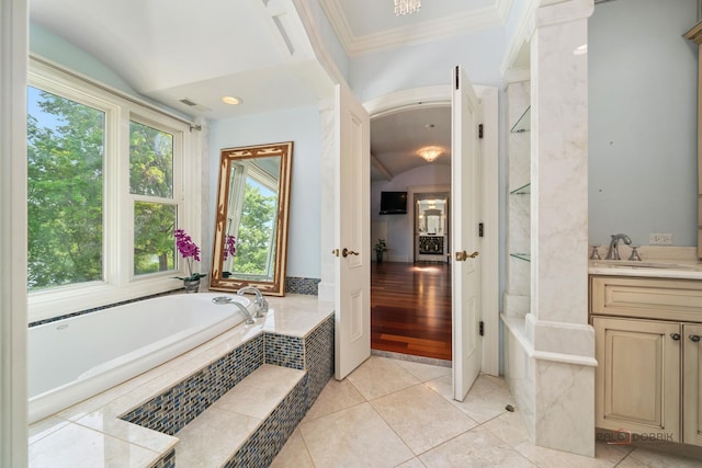 2426 Lexington Dr, Long Grove, IL 60047 - bathroom with a garden tub, lofted ceiling, vanity, tile patterned flooring, and crown molding