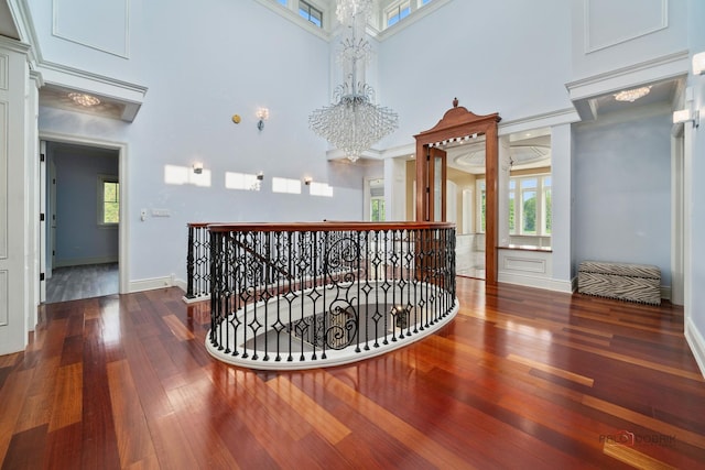 2426 Lexington Dr, Long Grove, IL 60047 - hall with an upstairs landing, a towering ceiling, a chandelier, and wood finished floors