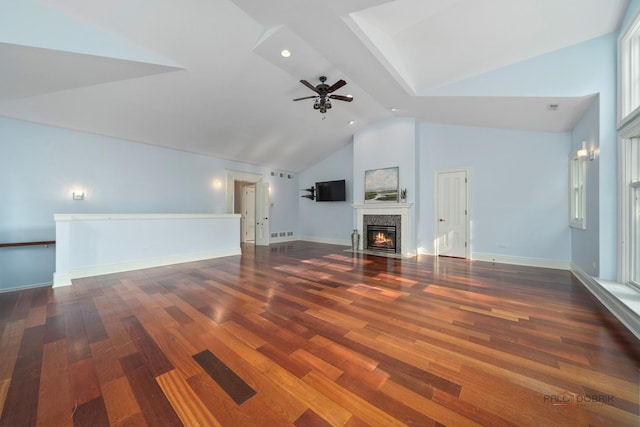 2426 Lexington Dr, Long Grove, IL 60047 - unfurnished living room with wood finished floors, high vaulted ceiling, ceiling fan, and a fireplace with flush hearth
