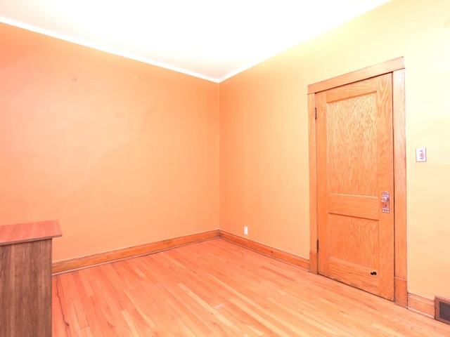 4249 W Melrose St, Chicago, IL 60641 - empty room with visible vents, light wood-style flooring, and baseboards