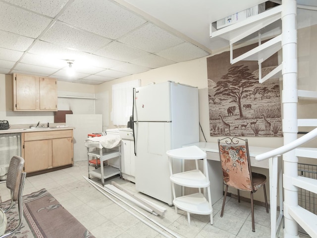 4249 W Melrose St, Chicago, IL 60641 - kitchen with light countertops, freestanding refrigerator, a paneled ceiling, and light brown cabinetry