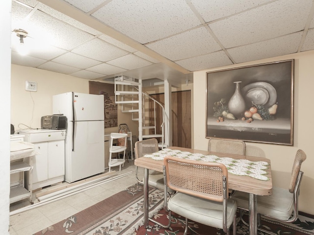 4249 W Melrose St, Chicago, IL 60641 - dining area featuring a paneled ceiling and stairway