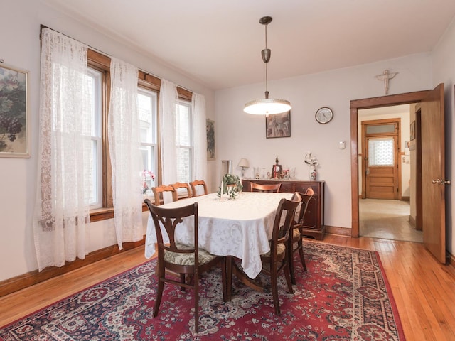 4249 W Melrose St, Chicago, IL 60641 - dining area featuring light wood-style flooring and baseboards