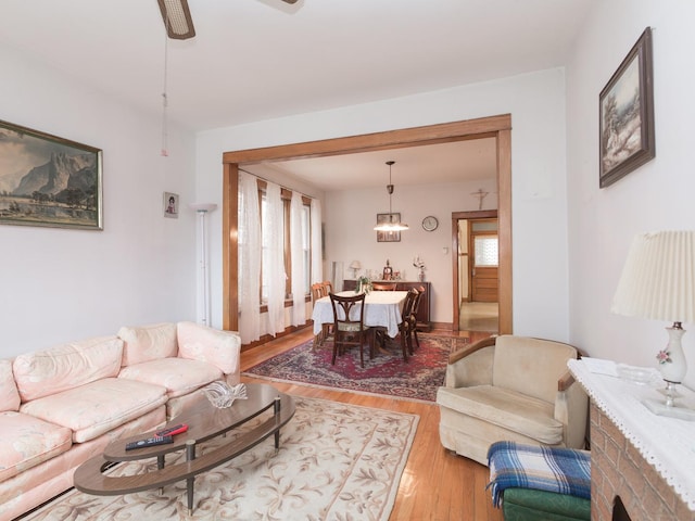 4249 W Melrose St, Chicago, IL 60641 - living room with light wood-style flooring and ceiling fan