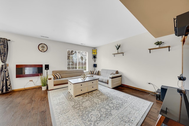 26247 N Green St Unit 2F, Mundelein, IL 60060 - living area featuring visible vents, baseboards, and wood finished floors