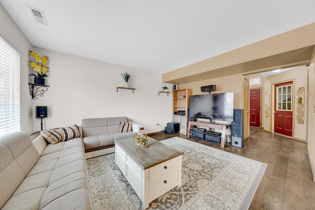 26247 N Green St Unit 2F, Mundelein, IL 60060 - living room featuring wood-type flooring and visible vents