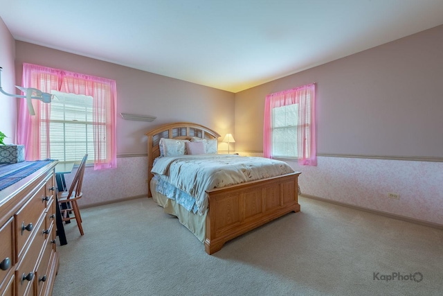 851 Bluestem Dr, Bolingbrook, IL 60440 - bedroom with light carpet, wallpapered walls, and multiple windows