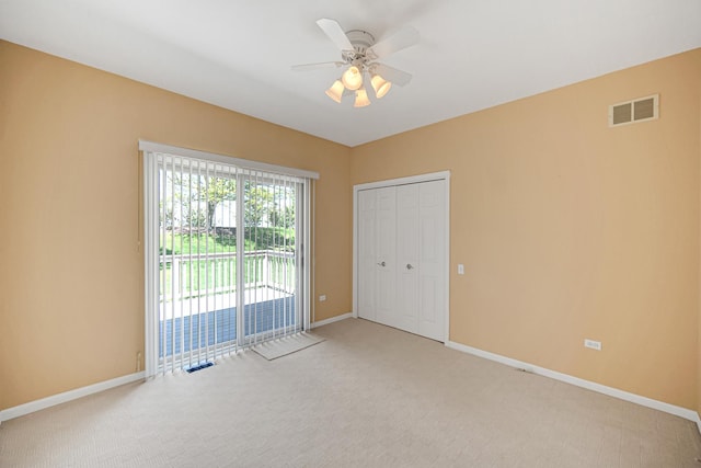 9154 Arbour Walk Dr, Frankfort, IL 60423 - spare room with light carpet, baseboards, and a ceiling fan