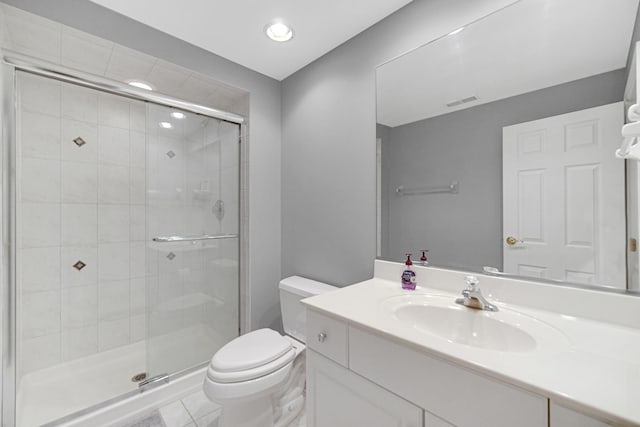 9154 Arbour Walk Dr, Frankfort, IL 60423 - bathroom featuring toilet, a stall shower, vanity, and recessed lighting