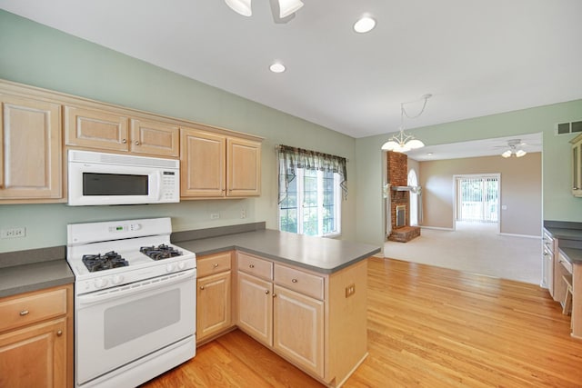 9154 Arbour Walk Dr, Frankfort, IL 60423 - kitchen with white appliances, light brown cabinetry, a peninsula, open floor plan, and recessed lighting