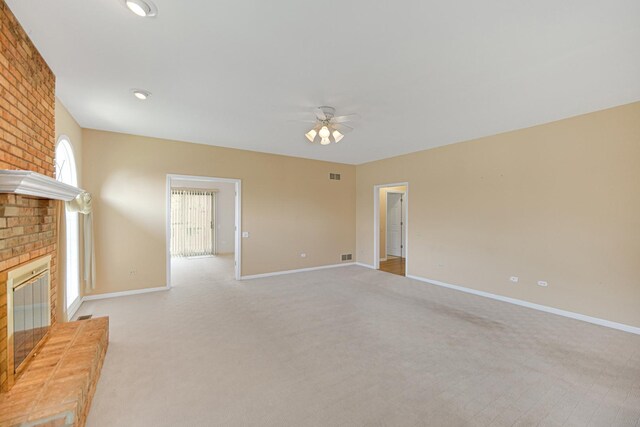 9154 Arbour Walk Dr, Frankfort, IL 60423 - unfurnished living room with a fireplace, ceiling fan, light carpet, and baseboards
