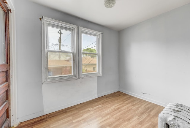 5048 W Wrightwood Ave, Chicago, IL 60639 - unfurnished room with light wood-type flooring