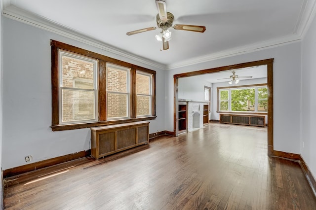 5048 W Wrightwood Ave, Chicago, IL 60639 - unfurnished living room with radiator heating unit, ceiling fan, wood finished floors, and ornamental molding