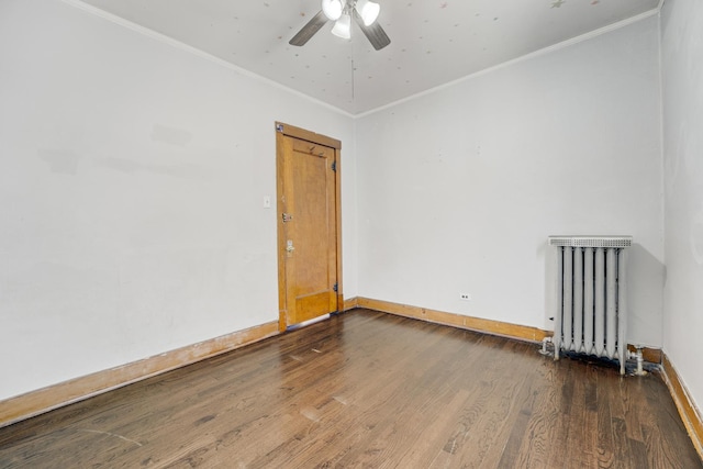 5048 W Wrightwood Ave, Chicago, IL 60639 - empty room with radiator heating unit, wood finished floors, ceiling fan, and crown molding