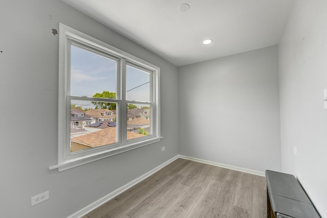 5048 W Wrightwood Ave, Chicago, IL 60639 - unfurnished room featuring light wood-type flooring and recessed lighting