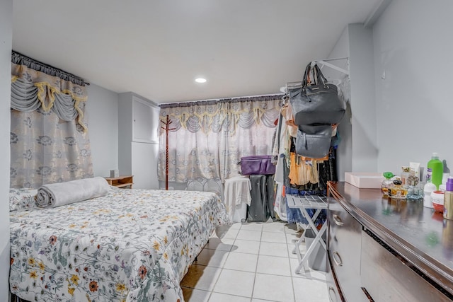 5048 W Wrightwood Ave, Chicago, IL 60639 - bedroom featuring light tile patterned flooring and recessed lighting