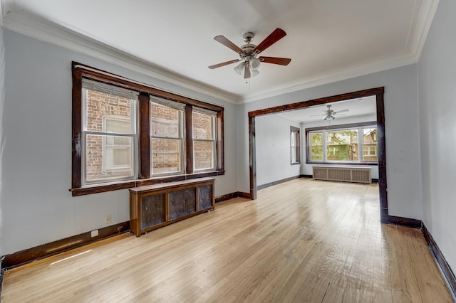 5048 W Wrightwood Ave, Chicago, IL 60639 - empty room featuring radiator heating unit, a ceiling fan, light wood-style flooring, and crown molding