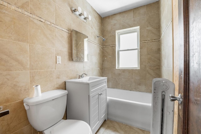 5048 W Wrightwood Ave, Chicago, IL 60639 - full bathroom with vanity, tile walls, bathing tub / shower combination, tile patterned floors, and radiator heating unit