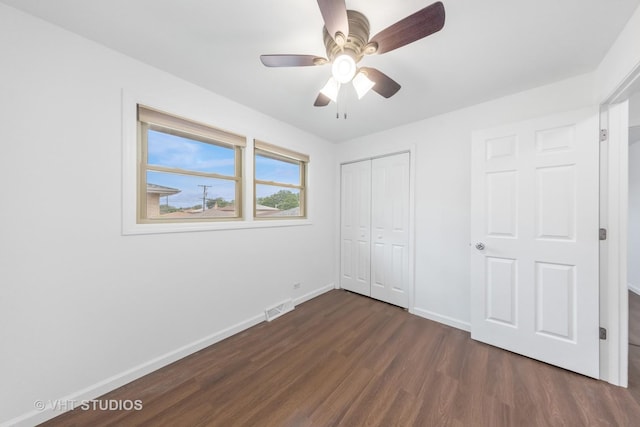 8800 44th Pl, Brookfield, IL 60513 - unfurnished bedroom with dark wood-style flooring, a closet, and ceiling fan