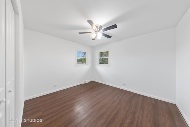 8800 44th Pl, Brookfield, IL 60513 - spare room with dark wood finished floors and ceiling fan