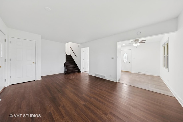 8800 44th Pl, Brookfield, IL 60513 - unfurnished living room featuring stairs, wood finished floors, and ceiling fan