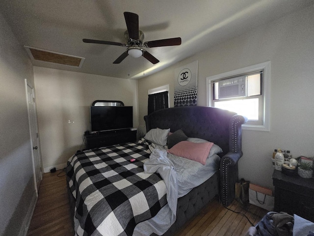 5750 W 65th St, Chicago, IL 60638 - bedroom featuring ceiling fan, attic access, wood finished floors, and baseboards